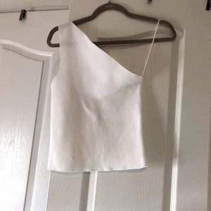 One shoulder white top